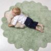 Tapis vert avec coussin Mouton