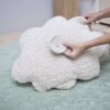 Tapis vert avec coussin Mouton